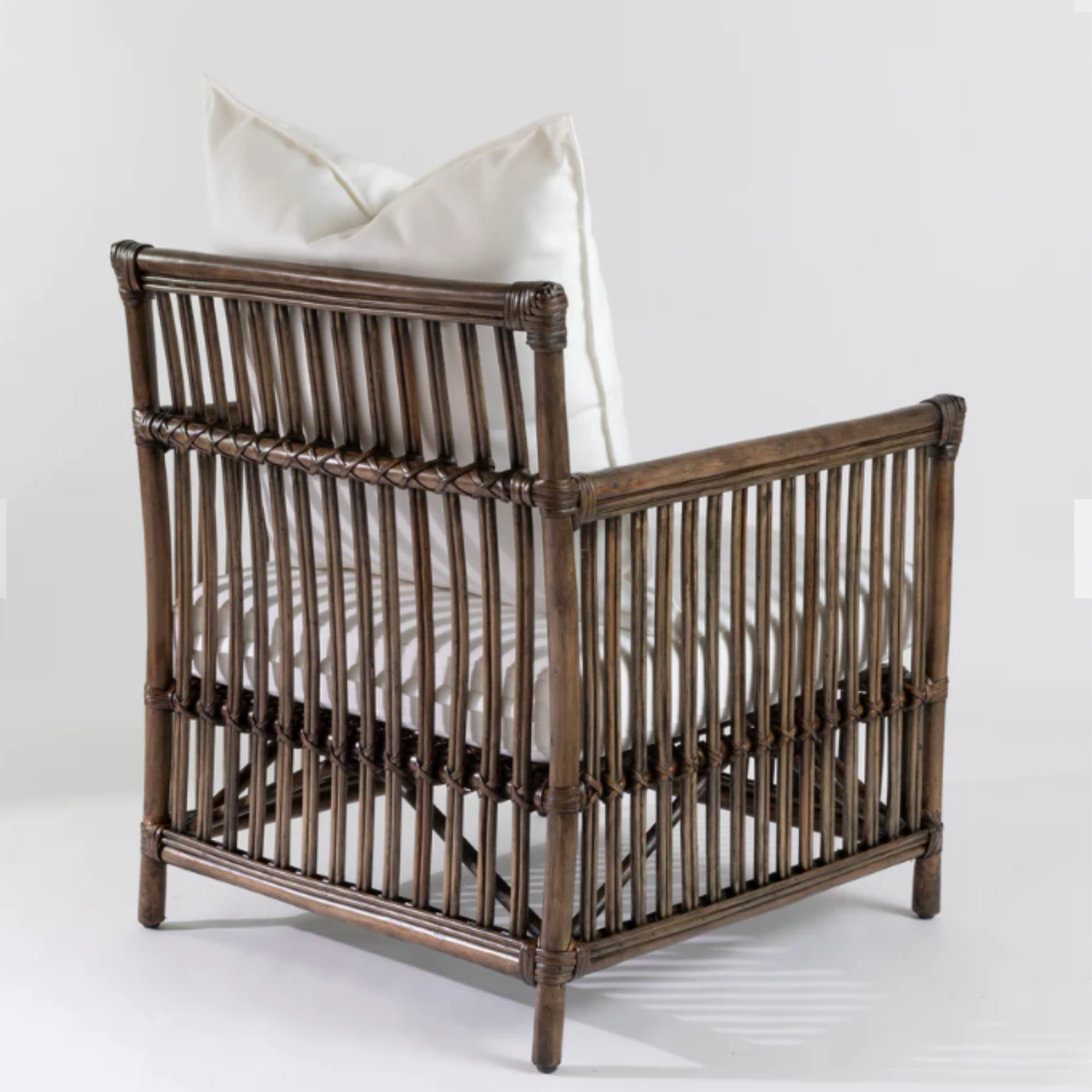 BERMUDA ARMCHAIR IN WALNUT RATTAN WITH NATURAL CANVAS SQUABS